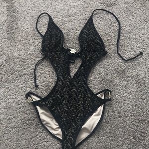 Victoria secret black and gold monokini one piece.